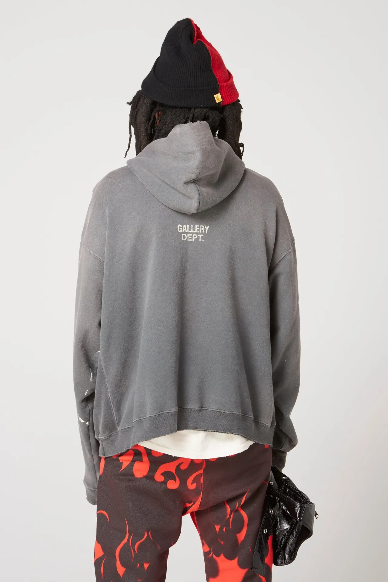 GALLERY DEPT. 90'S RECYCLE HOODIE WASHED BLACK 90'S washed hoodie with distressed eco-friendly slogans. Washed black S-XL. Ready-made garments are washed and dyed again. Multiple spots throughout the body are spray-faded. The ribs are cut and worn.